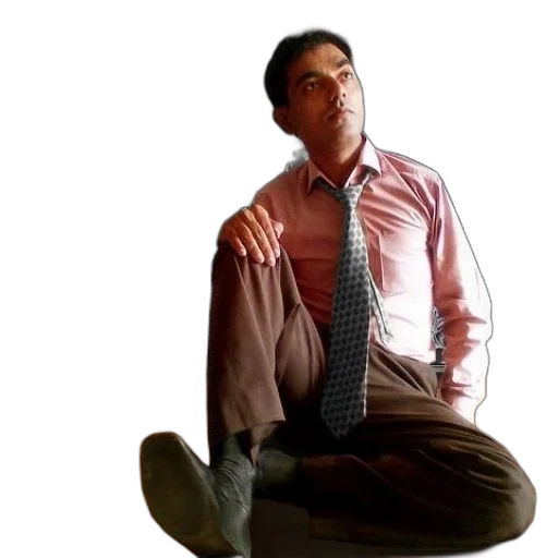 staff, man, pink, shirt, tie, sits, cross-legged, against transparent PNG cut-out