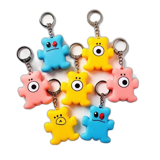 collection, colorful, cartoon, character, keychains, displayed, white, background transparent PNG cut-out