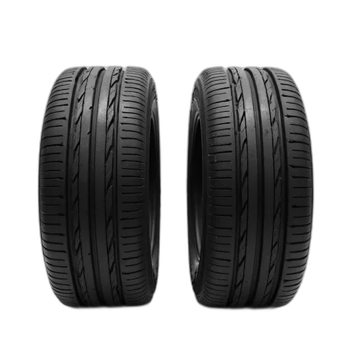 car, two, identical, black, tires, placed, side, against transparent PNG cut-out