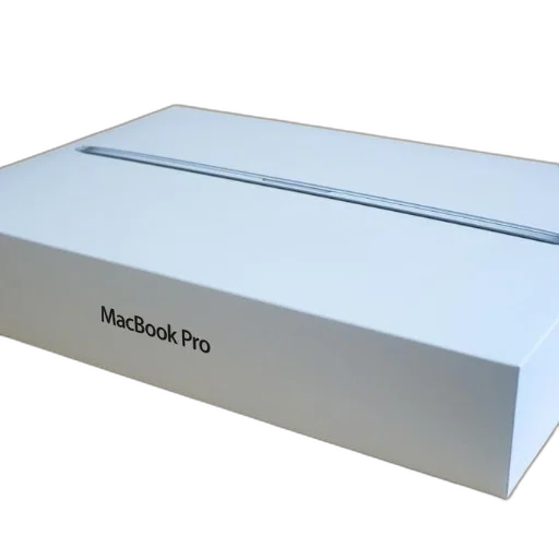 white, box, labeled, macbook, pro, sits, wooden, surface transparent PNG cut-out